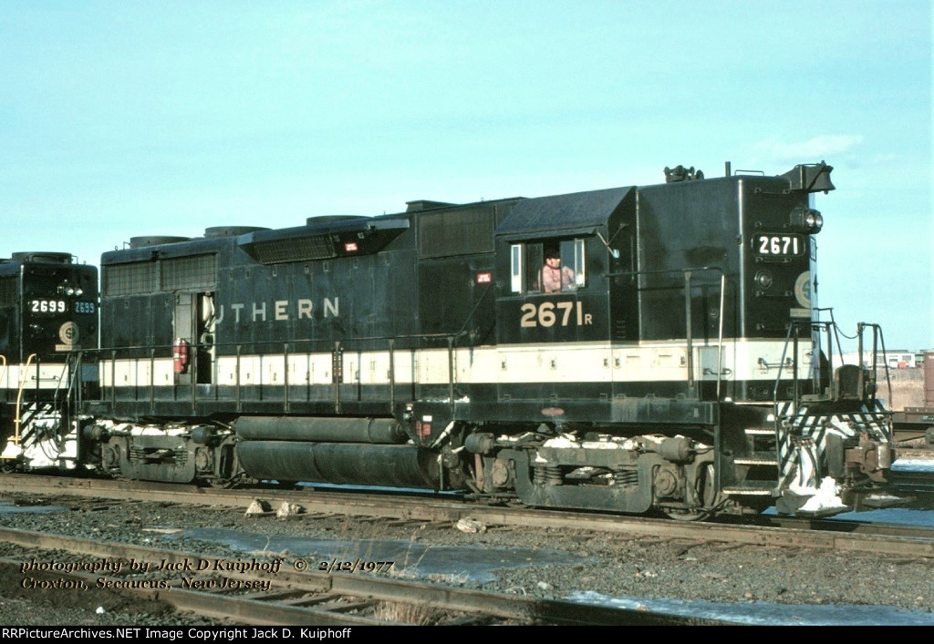 Southern, SRR GP35 2671 riding on traded Alco trucks is at ex-Erie, Conrails Croxton engine terminal, Secaucus, New Jersey. February 12, 1977. 